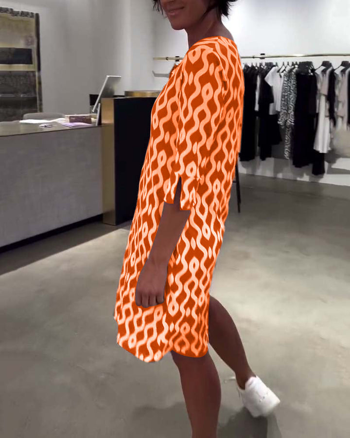 JACKY - VESTIDO DISEÑADO CON ESTAMPADO DE LARGO MEDIO Y ESCOTE