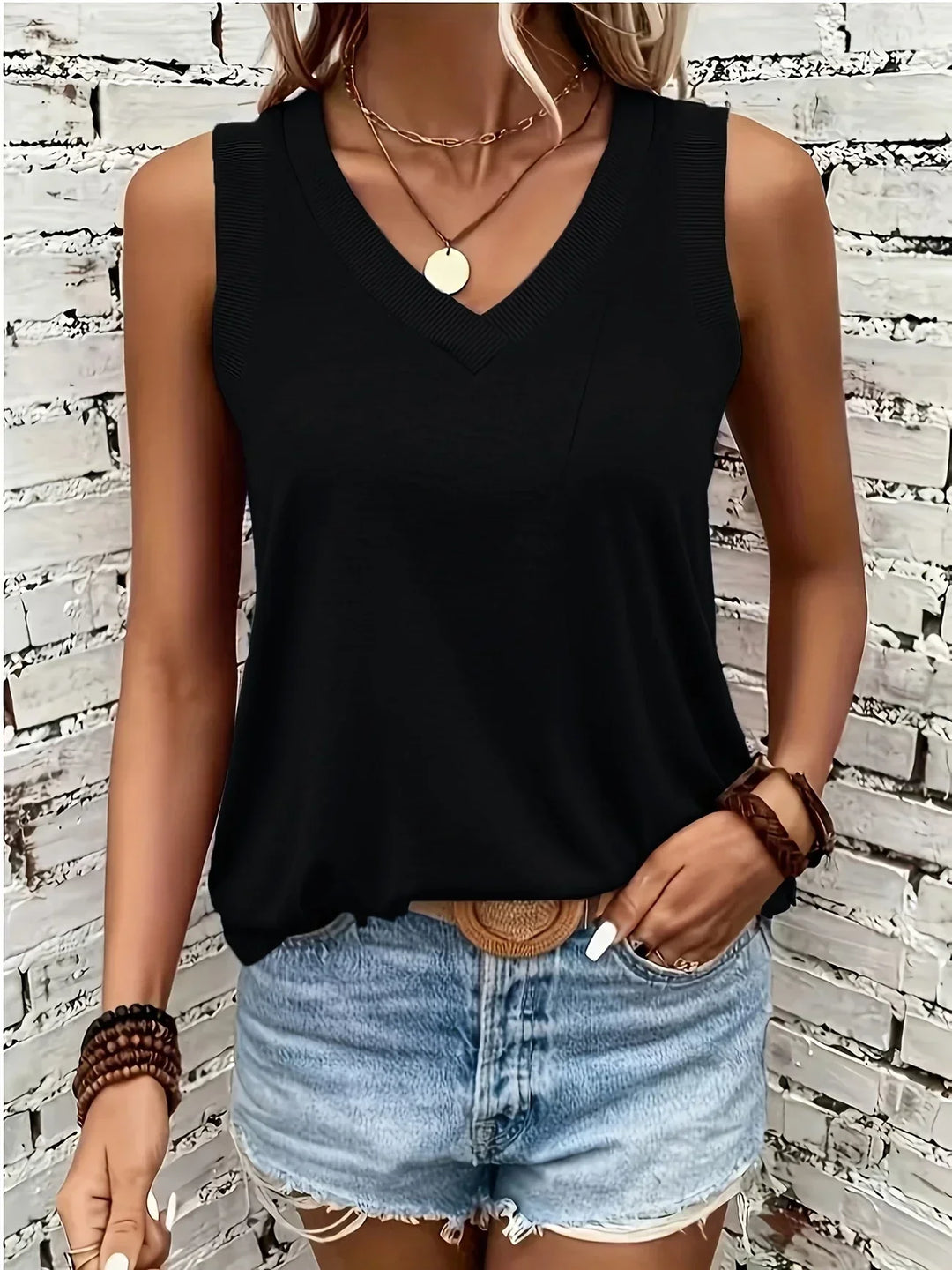ARCADIA - BLUSA SIN MANGAS CON ESCOTE EN V AIREADA