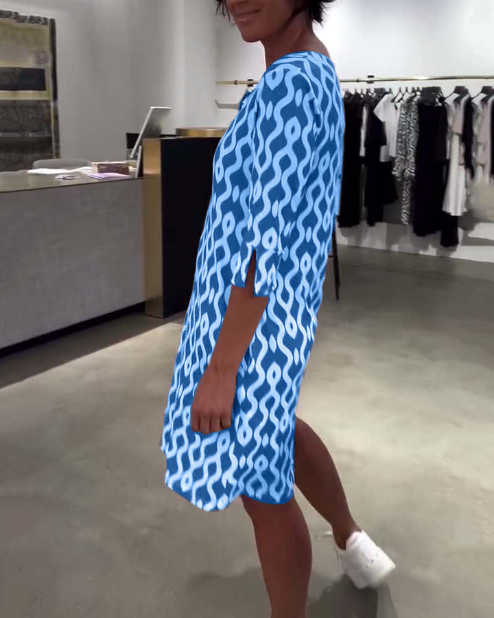 JACKY - VESTIDO DISEÑADO CON ESTAMPADO DE LARGO MEDIO Y ESCOTE