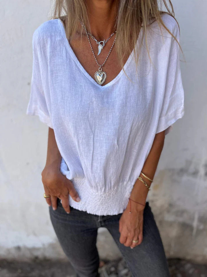 NIXIE - BLUSA RELAJADA DE ALGODÓN Y LINO CON ESCOTE EN V Y DISEÑO AIREADO