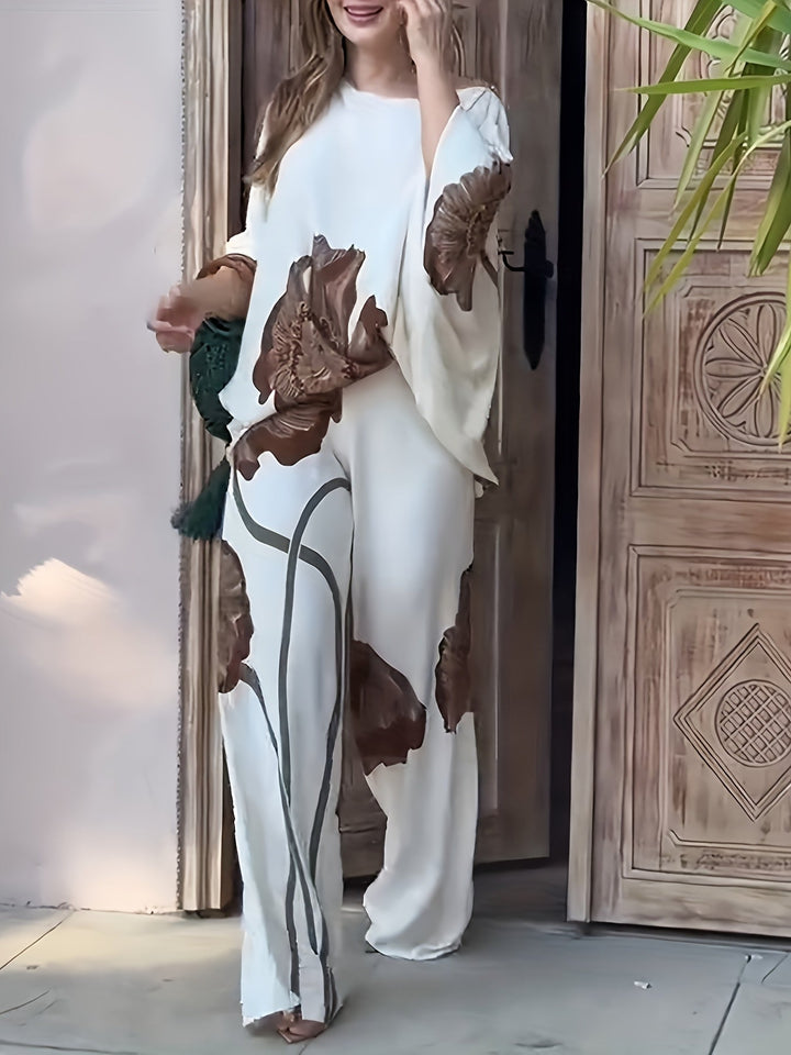 VEGA - CONJUNTO DE BLUSA FLORAL CON HOMBROS DESCUBIERTOS Y PANTALONES