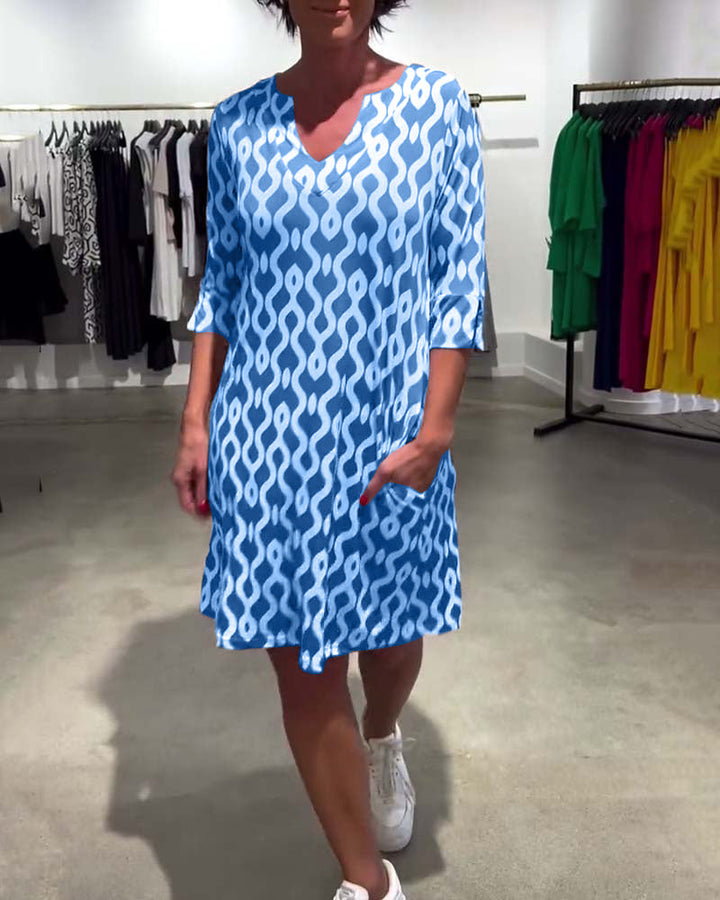 JACKY - VESTIDO DISEÑADO CON ESTAMPADO DE LARGO MEDIO Y ESCOTE