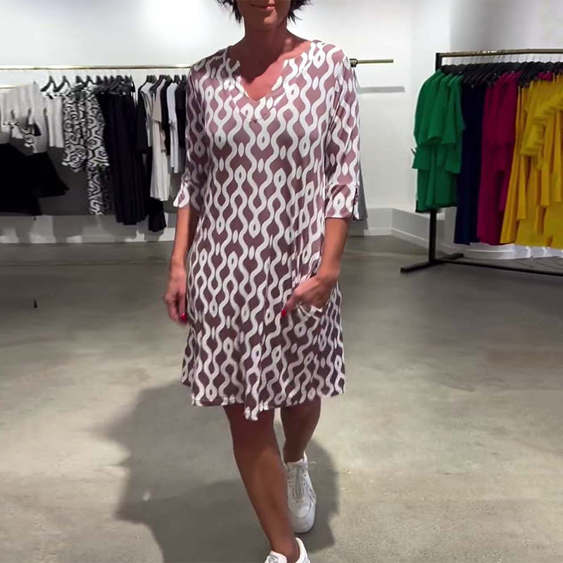 JACKY - VESTIDO DISEÑADO CON ESTAMPADO DE LARGO MEDIO Y ESCOTE