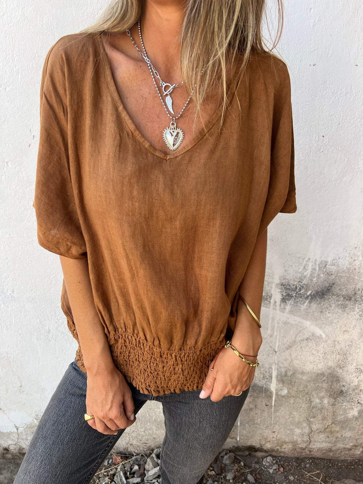 NIXIE - BLUSA RELAJADA DE ALGODÓN Y LINO CON ESCOTE EN V Y DISEÑO AIREADO