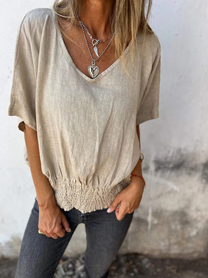 NIXIE - BLUSA RELAJADA DE ALGODÓN Y LINO CON ESCOTE EN V Y DISEÑO AIREADO