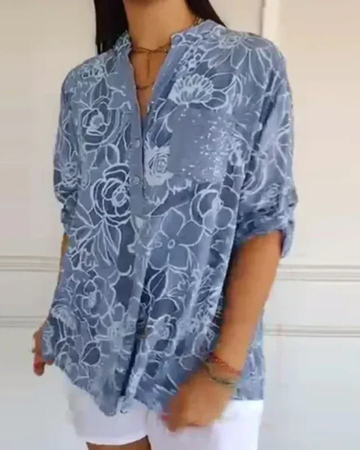 CLARISSE - BLUSA FLORAL CON BOLSILLO