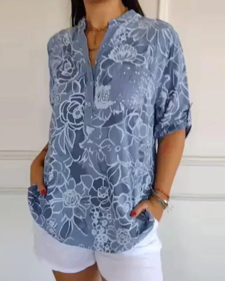 CLARISSE - BLUSA FLORAL CON BOLSILLO