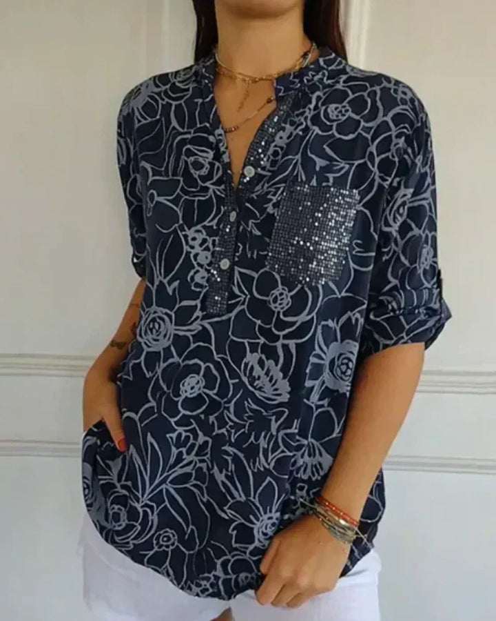 CLARISSE - BLUSA FLORAL CON BOLSILLO
