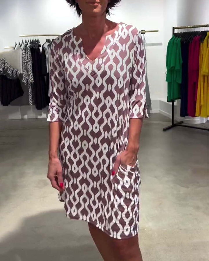 JACKY - VESTIDO DISEÑADO CON ESTAMPADO DE LARGO MEDIO Y ESCOTE