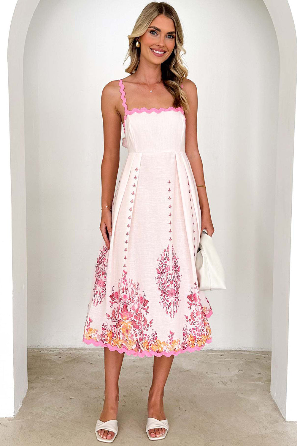 ARETE - VESTIDO SIN ESPALDA CON FLORES