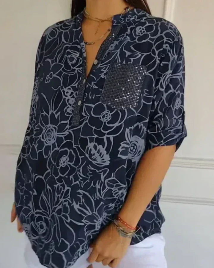 CLARISSE - BLUSA FLORAL CON BOLSILLO