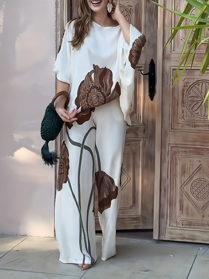 VEGA - CONJUNTO DE BLUSA FLORAL CON HOMBROS DESCUBIERTOS Y PANTALONES